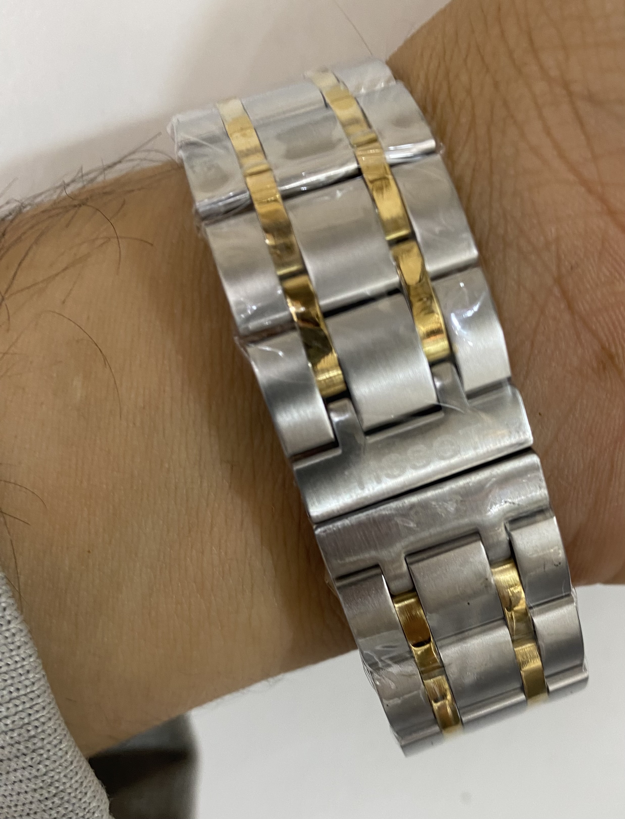 ساعت مردانه تیسوت T035 طلایی نقره ای